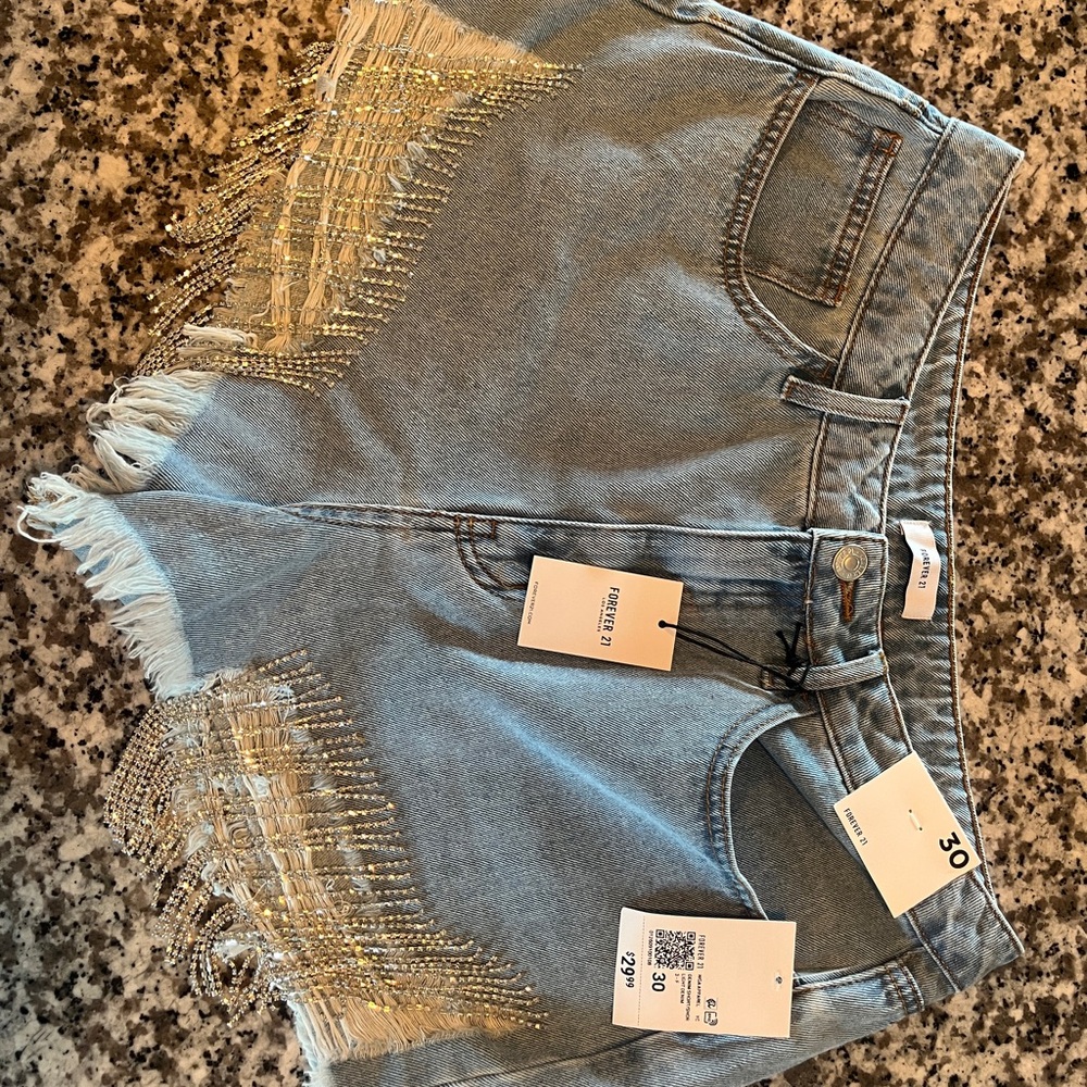 Stylish Denim Shorts with Gold Accents